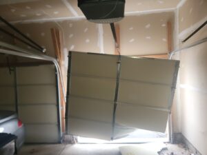 Off-track garage door realignment service in DC and Northern Virginia