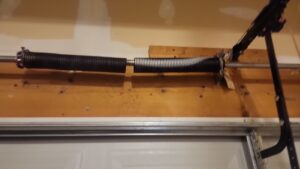 Broken garage door spring repair technician in Maryland